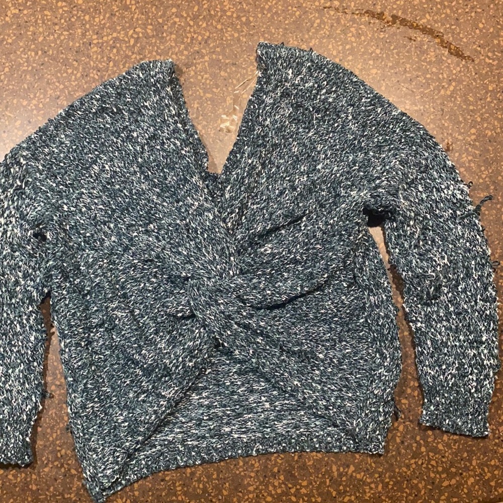Francesca’s green knot back sweater